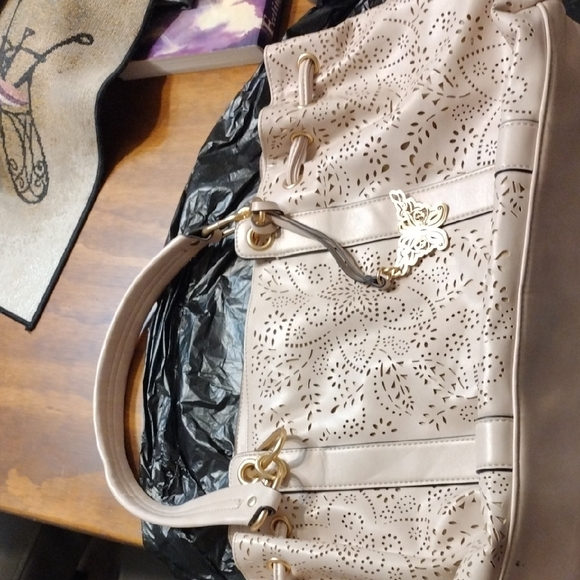 Jessica Simpson Handbags - Jessica Simpson Cream Shoulder Bag with Cut-Out Design